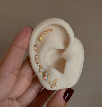 Piercing Eli ópalo
